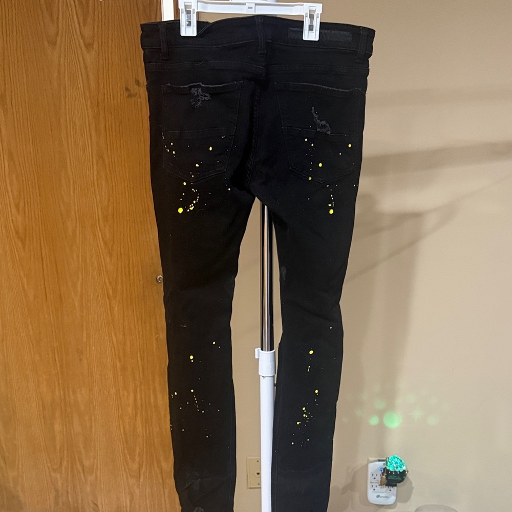 Black Distressed Jeans with Red and Yellow Graphic Patches - Picture 2 of 2